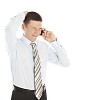 Isolated businessman getting bad news over the phone