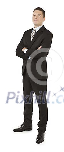 Isolated serious looking businessman standing
