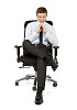 Isolated businessman sitting on the chair