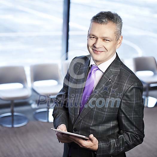 Happy business with a tablet computer