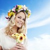Beautiful blonde girl with floral head wreath