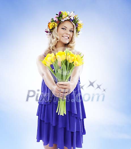 Natural Nordic summer girl handing out a flower bouquet