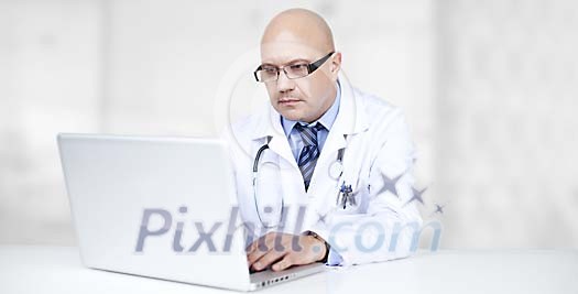 Doctor with a laptop Doctor with a laptop