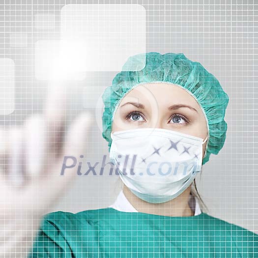 Surgeon touching an app on the touchscreen