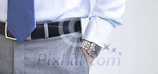 Male holding his hand in the pocket Male holding his hand in the pocket