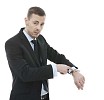 Isolated businessman pointing to his watch