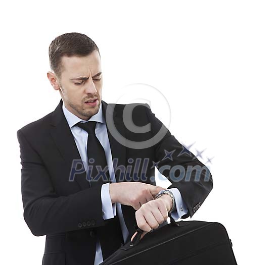Isolated stressed businessman looking at his watch Isolated stressed businessman looking at his watch
