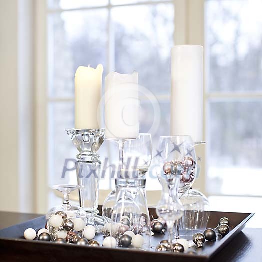 Candles on the wooden plate as a decoration Candles on the wooden plate as a decoration