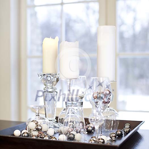 Candles on the wooden plate as a decoration