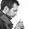 Man starting to light up a cigarette