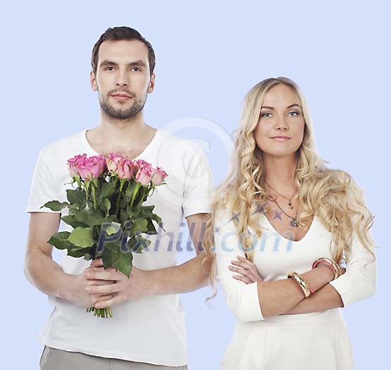 Man and woman with a rose bouquet