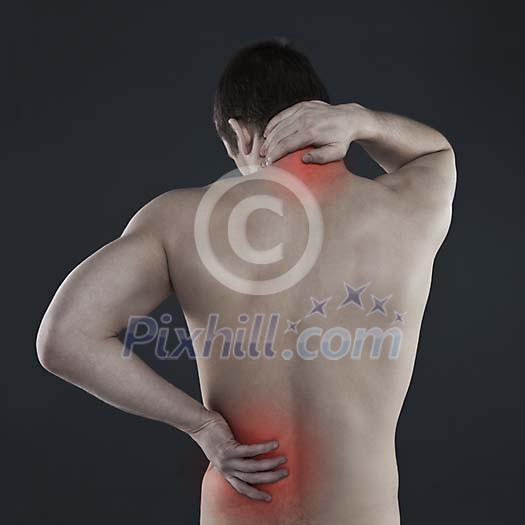 Man touching his sore neck and back
