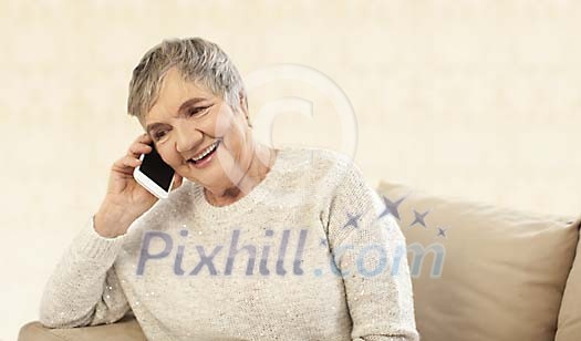 Older female talking to a phone