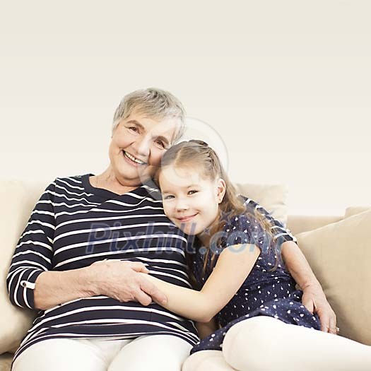 Girl with older woman on the sofa Girl with older woman on the sofa