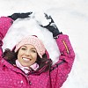 Smiling woman on the snow