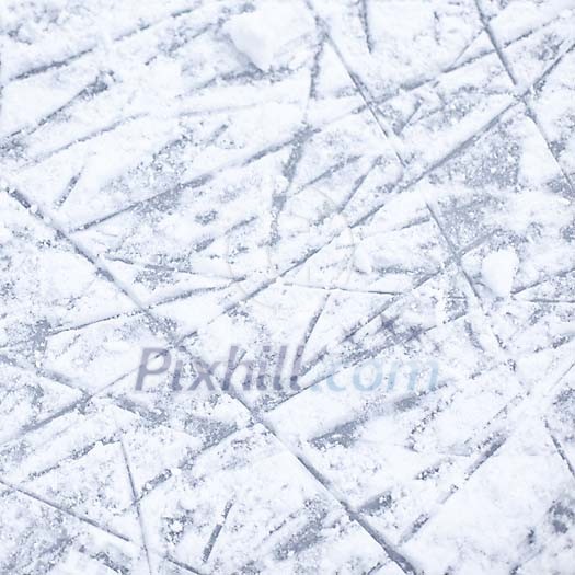 Backround of ice covered in skate tracks Backround of ice covered in skate tracks