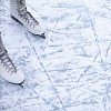 Skater maksing new tracks on ice