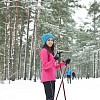 Woman skiing in the forest