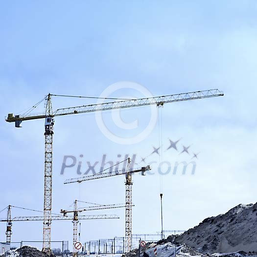 Cranes on the building site Cranes on the building site