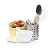 Isolated kitchen utensils with vegetables
