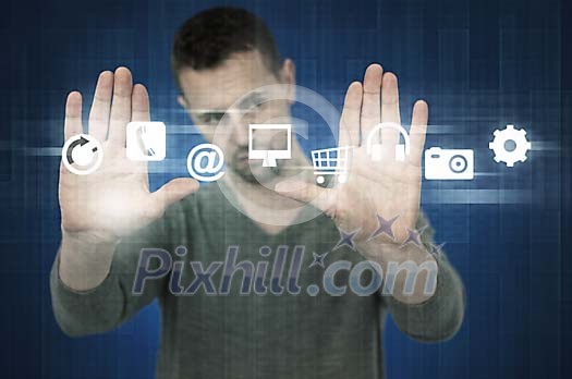 Male standing by the touchscreen with choices Male standing by the touchscreen with choices
