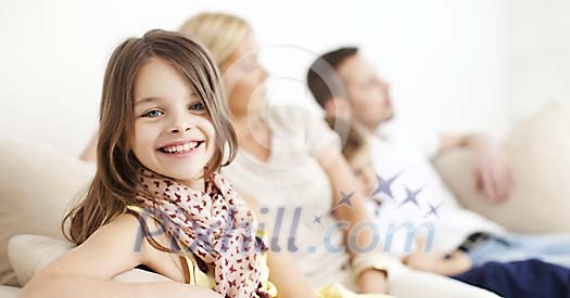 Girl smiling, spending time with her family