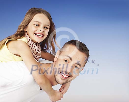 Girl on her fathers back