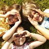 Children covering their eyes from sun