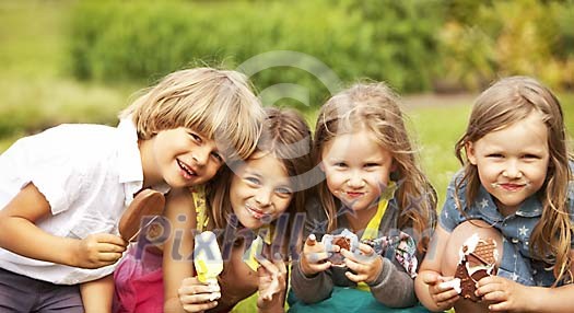 Boy and girls eating icecream