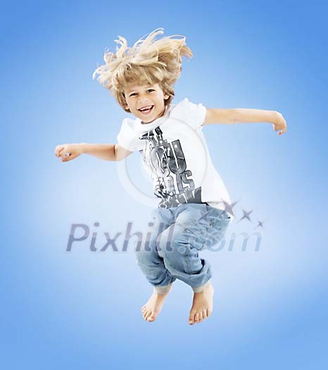 Boy jumping high in the air