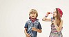 Boy and a girl with soap bubbles