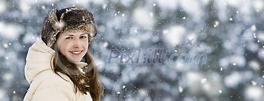 Smiling woman in snowfall Smiling woman in snowfall