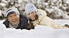 Couple smiling in the snow