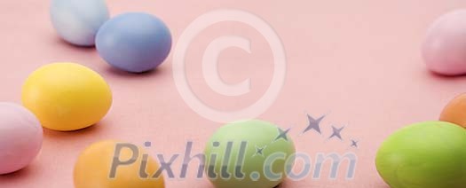 Different coloured easter eggs on the table