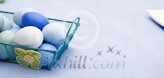 Blue easter eggs in a basket Blue easter eggs in a basket