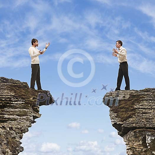 Two men argueing over the gap in the rocks