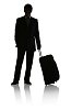 Silhouette of a man with suitcase