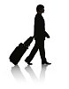Silhouette of a man with suitcase from the side
