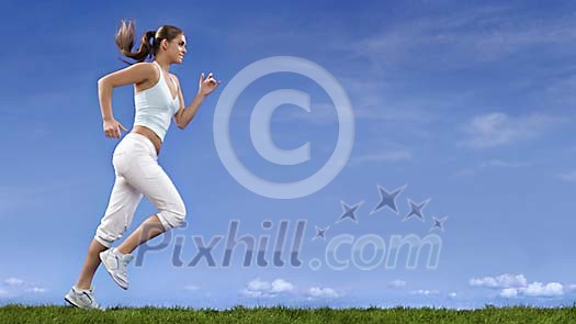 Woman jogging on grass Woman jogging on grass