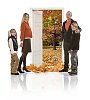 Family in white space by open door to the autumn nature
