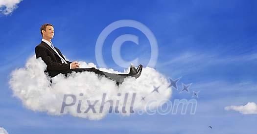 Business man sitting on a cloud conceptual