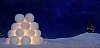 Close-up of a snow lantern in magical winter landscape