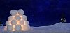 Close-up of a snow lantern in magical winter landscape