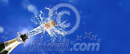 Sparkling champagne bottle popped open in front of stylish blue background