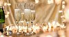 Panorama shaped background with champagne glasses and glittering lights