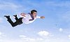Businessman flying in the sky conceptual