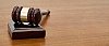 Chairman's gavel on a wooden table