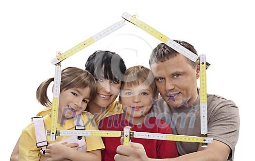 Family looking through a house shaped carpenter's measure