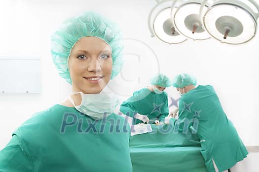 Relaxed operating room personnel at work