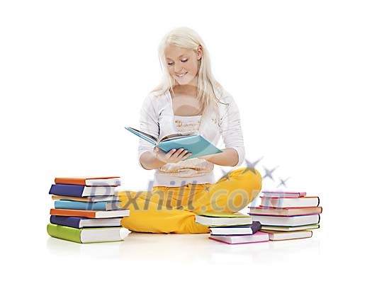Girl sitting on floor surrounded by piles of books